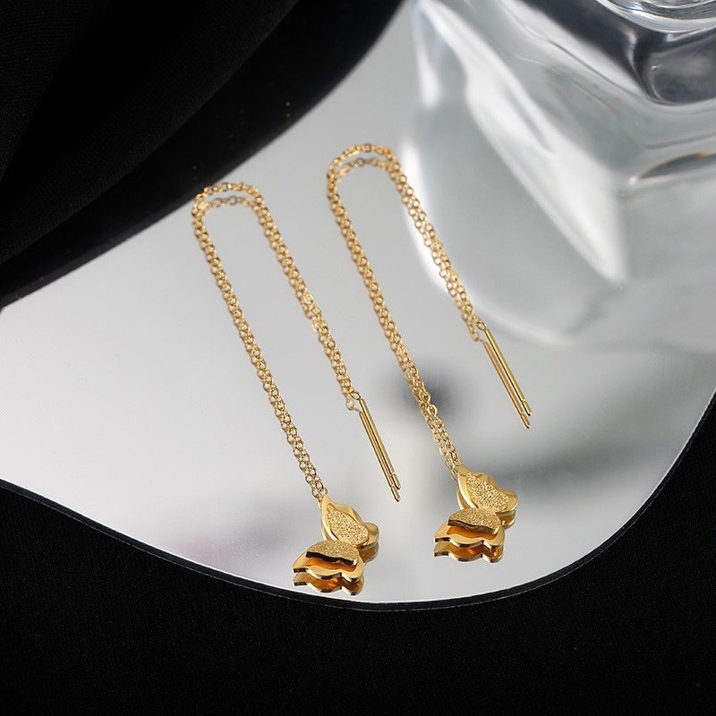 Brincos de aço inoxidável 18K com design exclusivo em formato de borboleta, um modelo longo e elegante que supera a moda Brincos de aço inoxidável 18K com design exclusivo em formato de borboleta, um modelo longo e elegante que supera a moda