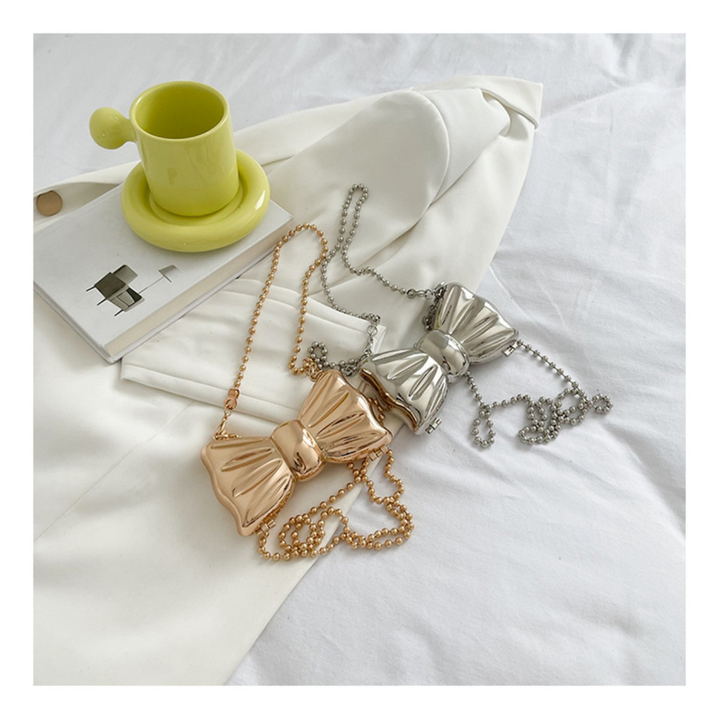 Bolsa feminina com laço metálico para mini festas Yb005 yobel Bolsa feminina com laço metálico para mini festas Yb005 yobel - Oferta na Shopee