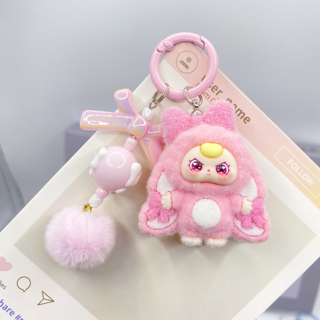 Chaveiro de desenho animado para bebê de três anos com laço de venda quente, boneca tridimensional, mochila, pingente, e Chaveiro de desenho animado para bebê de três anos com laço de venda quente