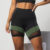 Short fitness de academia com detalhe em tule e recorte em cores tendências