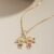 Colar Pingente Casal de filhos Cravejados Banhados a Ouro 18K