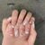 Lovito Unhas artificiais casuais em forma de coração com arco estilo balé para mulheres LFA44132