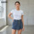 Lovito Shorts Jeans Feminino Casual Lavado Assimétrico com Spikes LBL05230 (Azul)