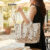 Lovito Bolsa Feminina Bordada com Borboleta e Múltiplos Bolsos para Estudantes e Trabalhadoras LFA55130